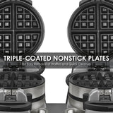 Close-up of two open Commercial Belgian Waffle Makers with triple-coated non-stick plates. The black gridded surfaces are visible, and the text overlay reads: “TRIPLE-COATED NONSTICK PLATES for Easy Removal of Waffles and Quick Cleanup.”.